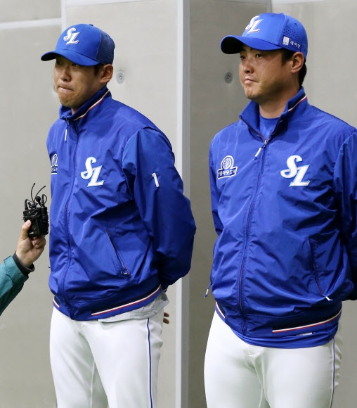 굳은 표정의 윤성환·안지만